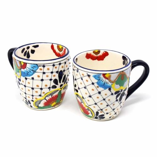 Encantada Rounded Mugs Dots and Flowers Set of Two
Jungle Pillows